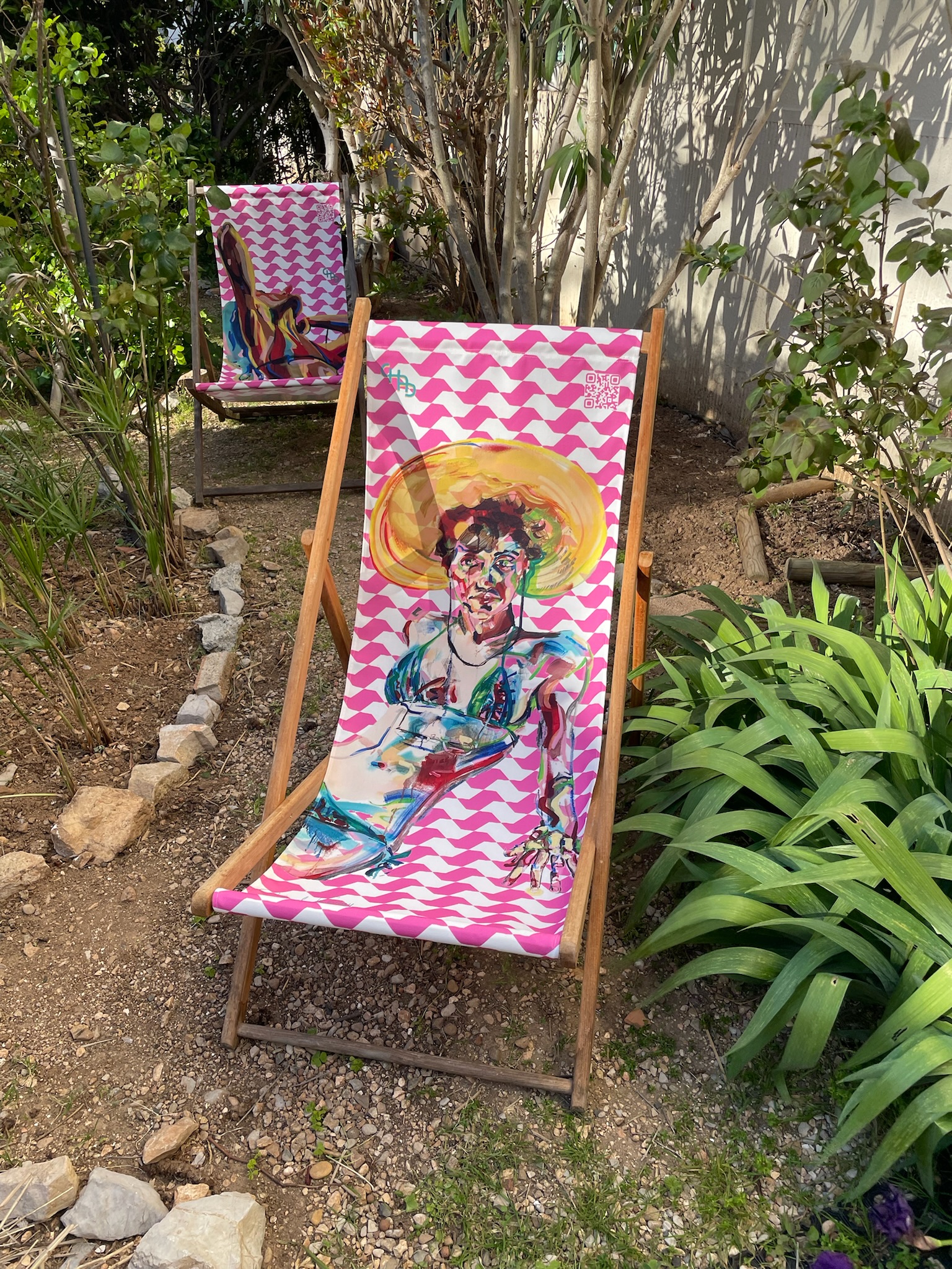 Art deckchair with figurative paintings of Brazilians in bikinis by Chad Keveny, South of France, Transat, chilienne, colourful